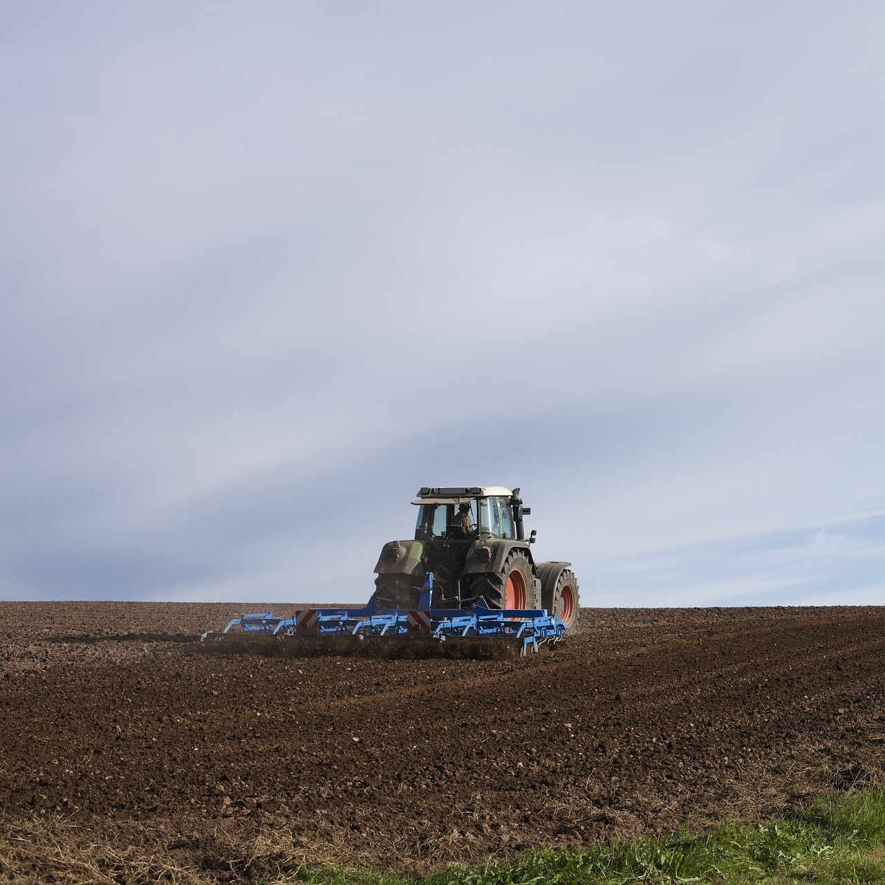 tractor plowing field